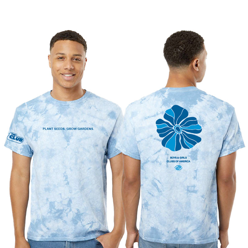 Light blue crystal-dyed short-sleeve t-shirt with “PLANT SEEDS. GROW GARDENS.” text on the front and large stylized flower graphic on the back, above the Boys & Girls Clubs of America logo.