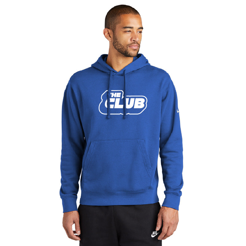 Man wearing a royal blue Nike pullover hoodie with a front pocket and drawstring hood, featuring “THE CLUB” logo in white across the chest.